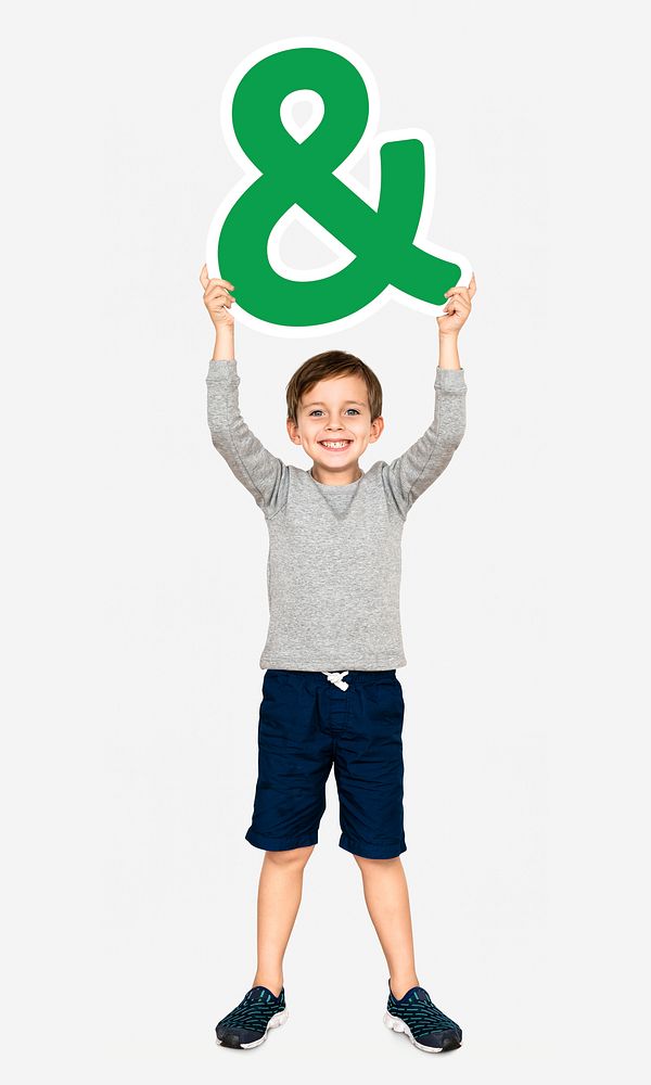 Boy holding an ampersand sign