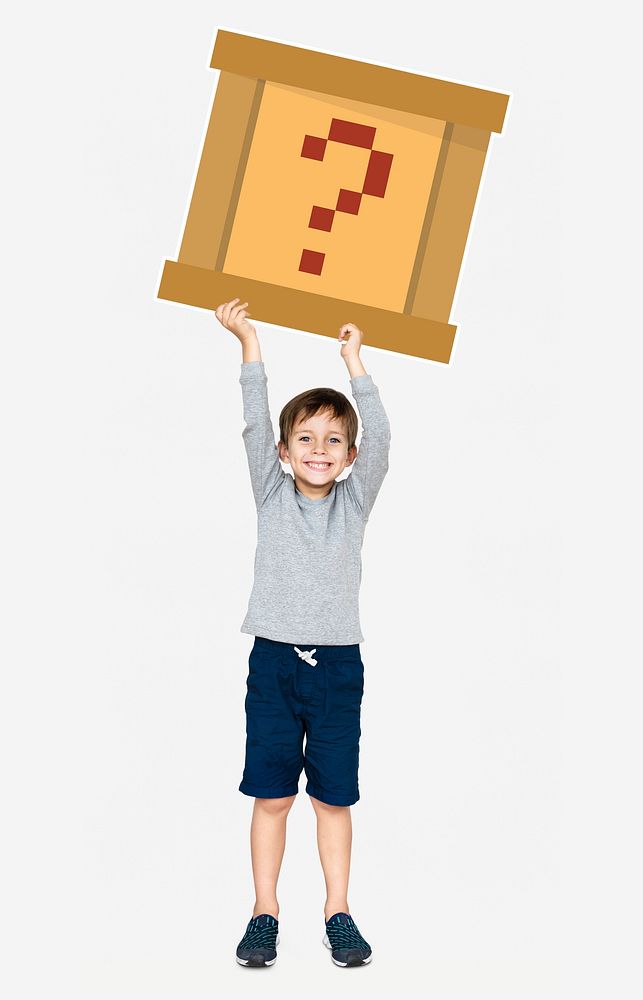 Happy boy holding a pixilated question mark icon