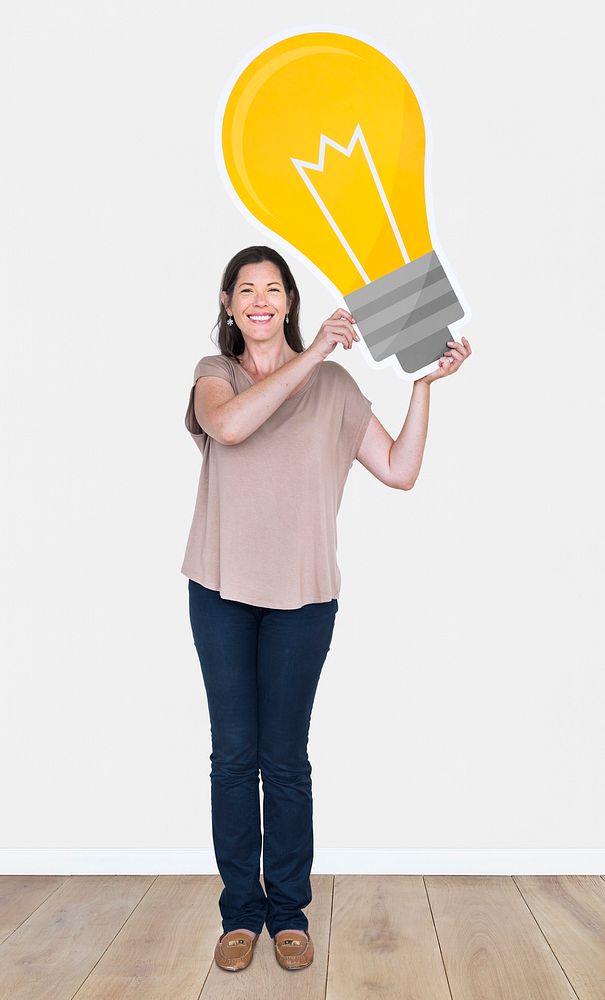 Happy woman holding a light bulb icon