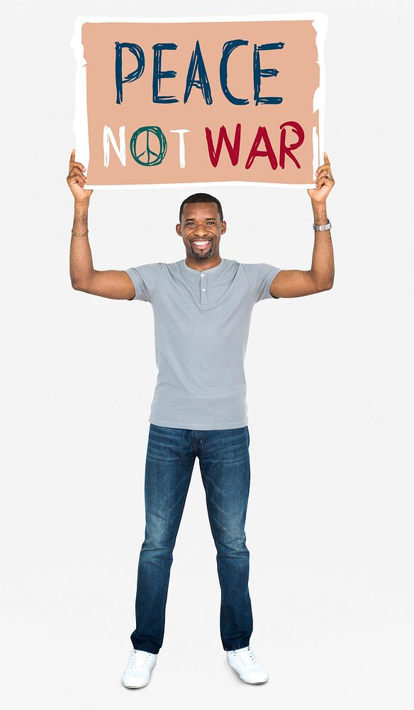 An African man holding peace not war signboard