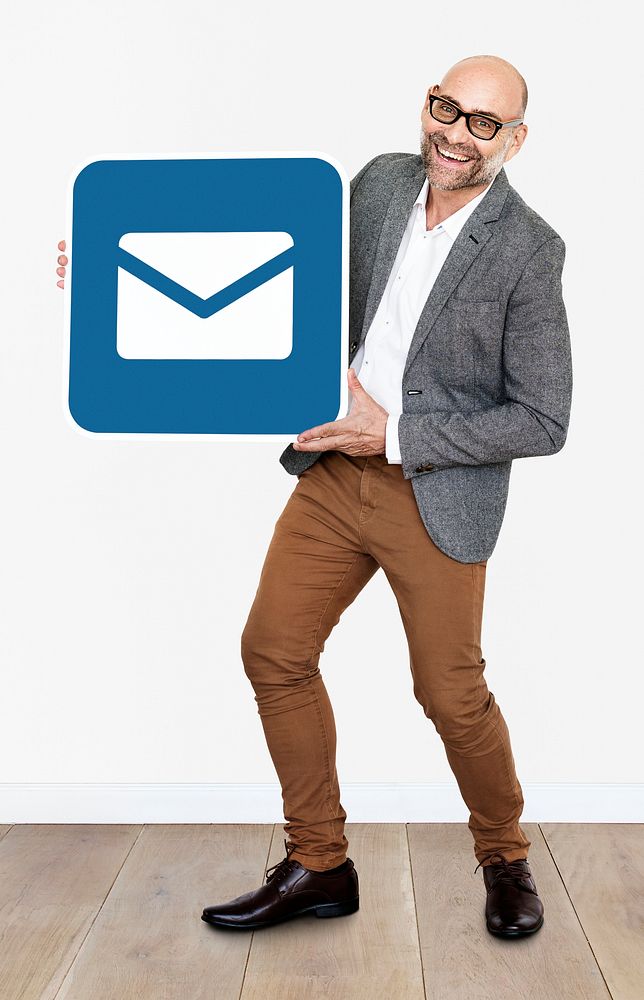 Happy businessman with an email icon