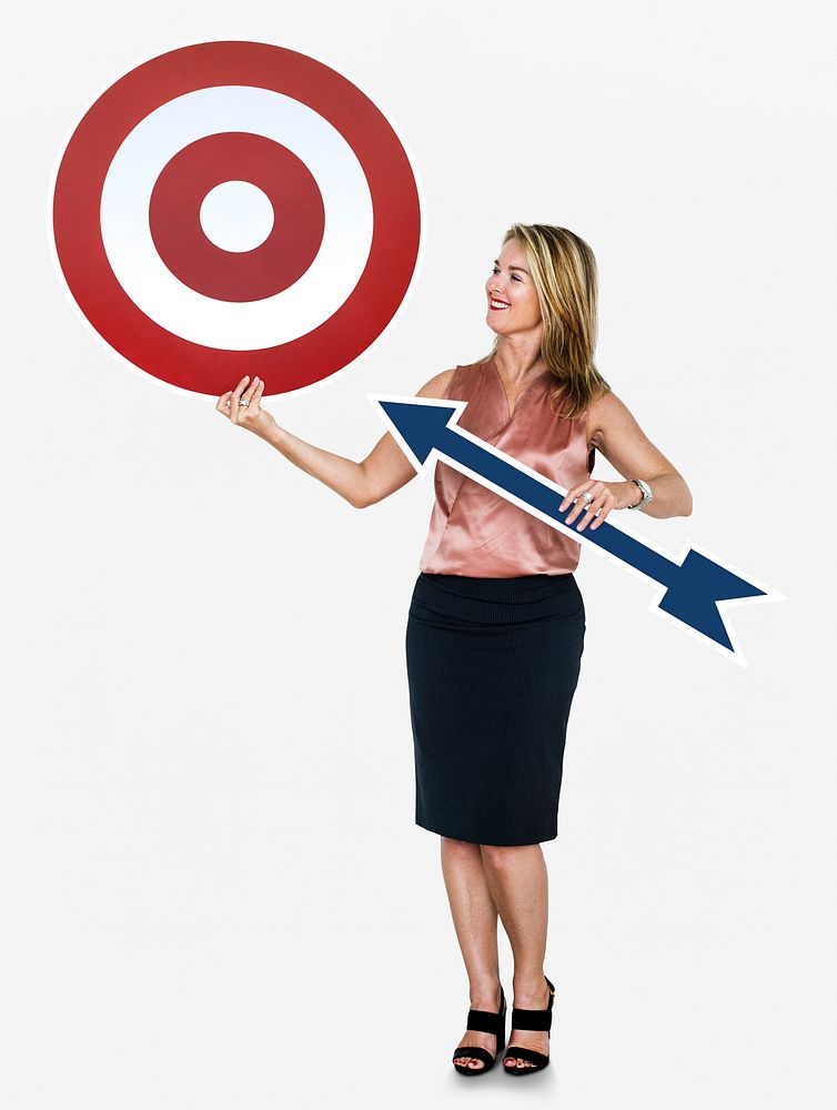 Businesswoman holding an arrow and a dartboard