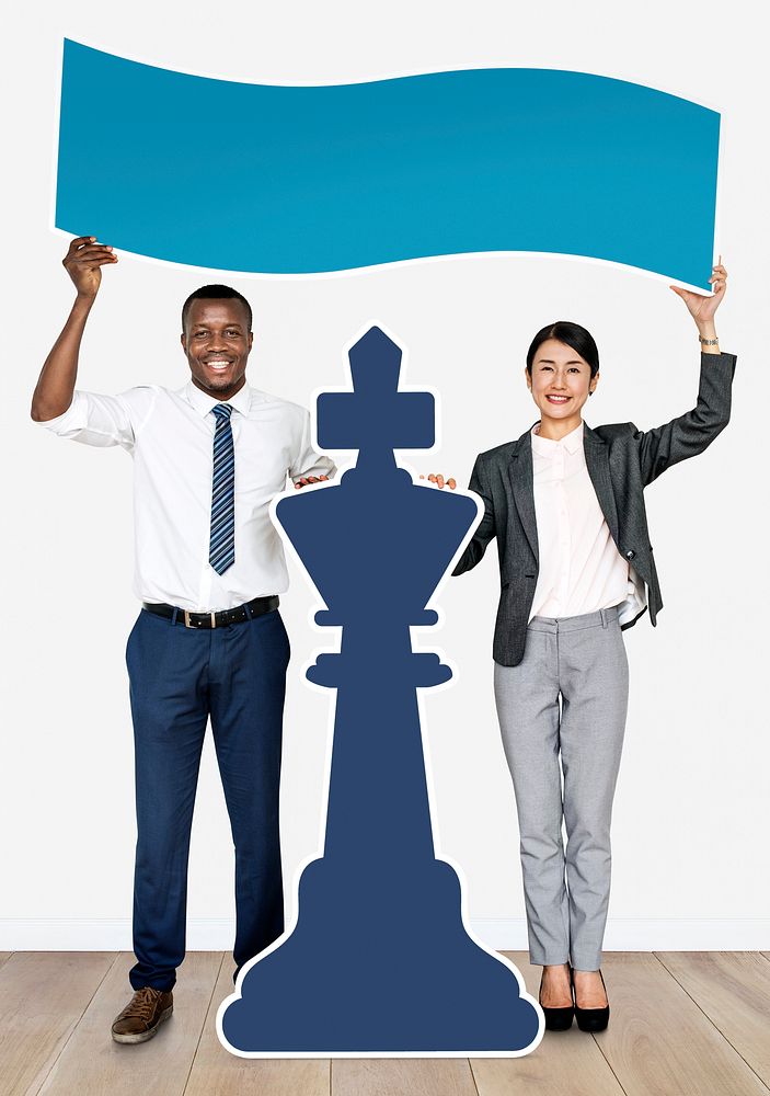 Diverse business people with a chess piece