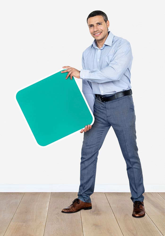 Happy man holding a green board