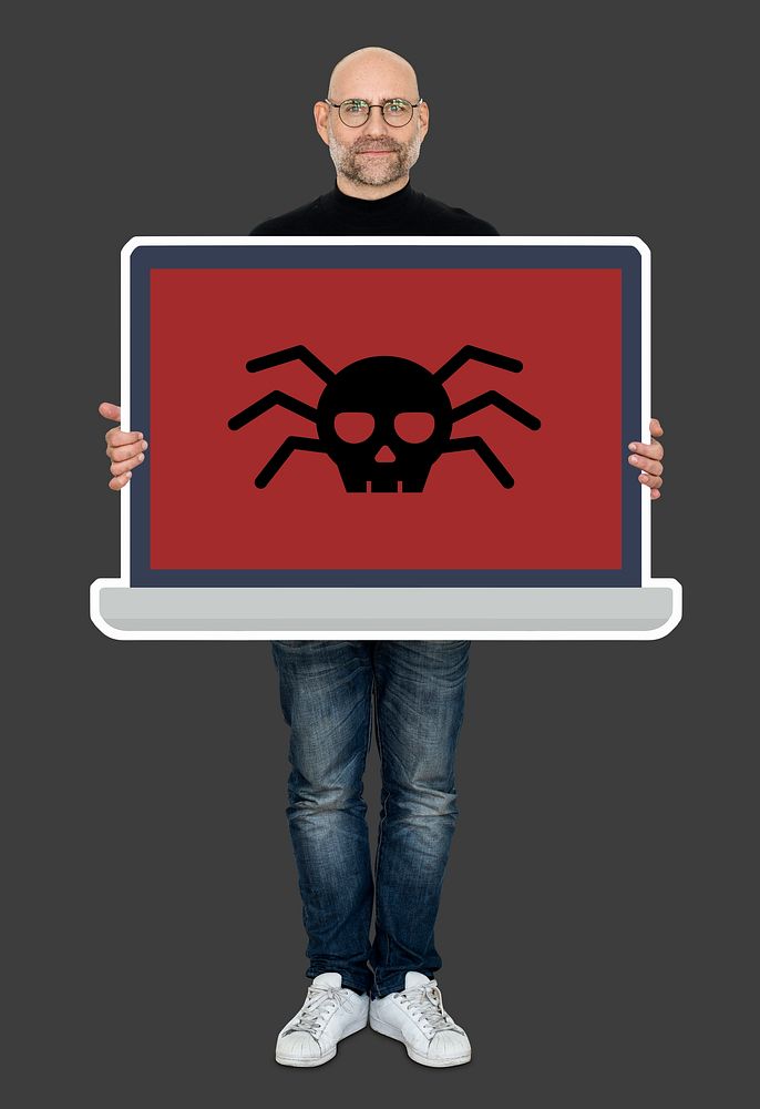 Man holding a laptop screen with a computer virus