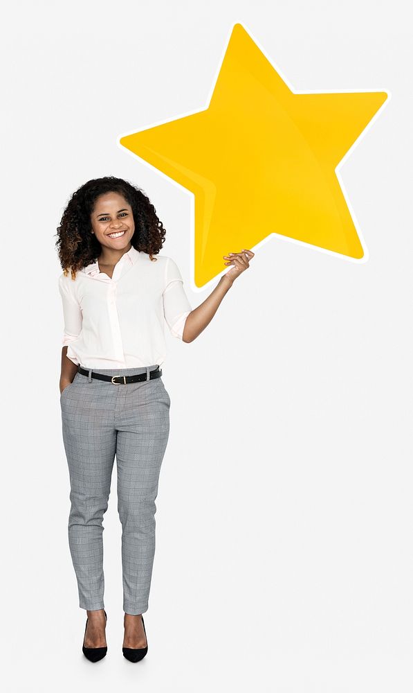 A cheerful woman holding a star