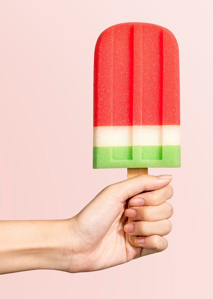 Hand with an ice pop in summertime mockup