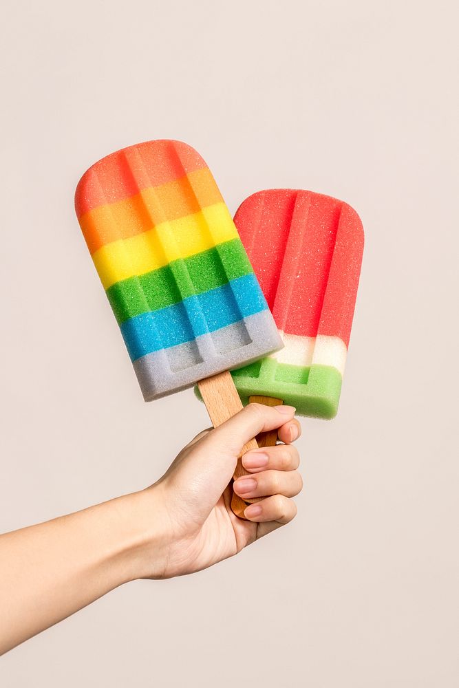 Hand with ice pops in summertime