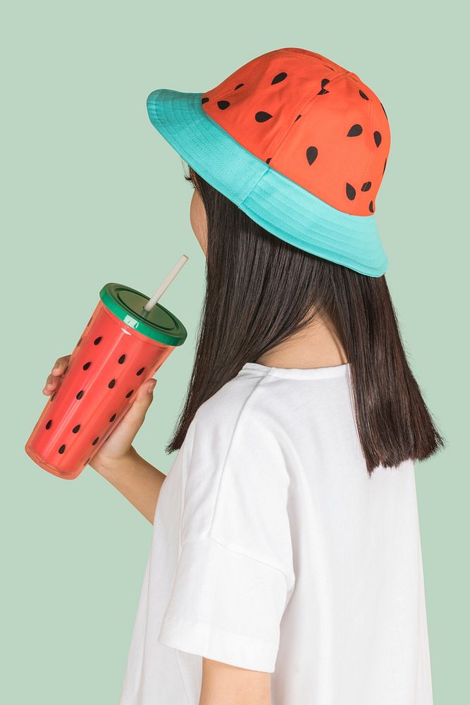 Woman drinking water from a cute watermelon printed tumbler