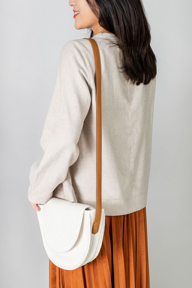 Asian woman carrying a white woven cotton rope bag mockup