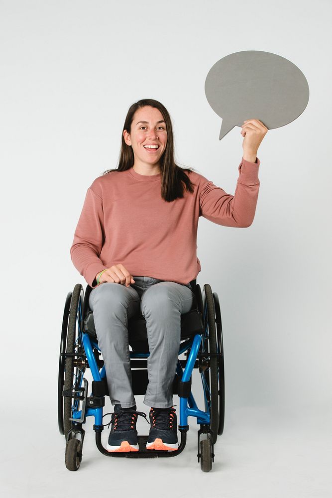Cool woman in a wheelchair showing a speech bubble
