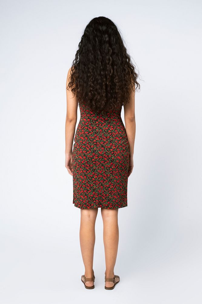 South American woman with long curly hair full body