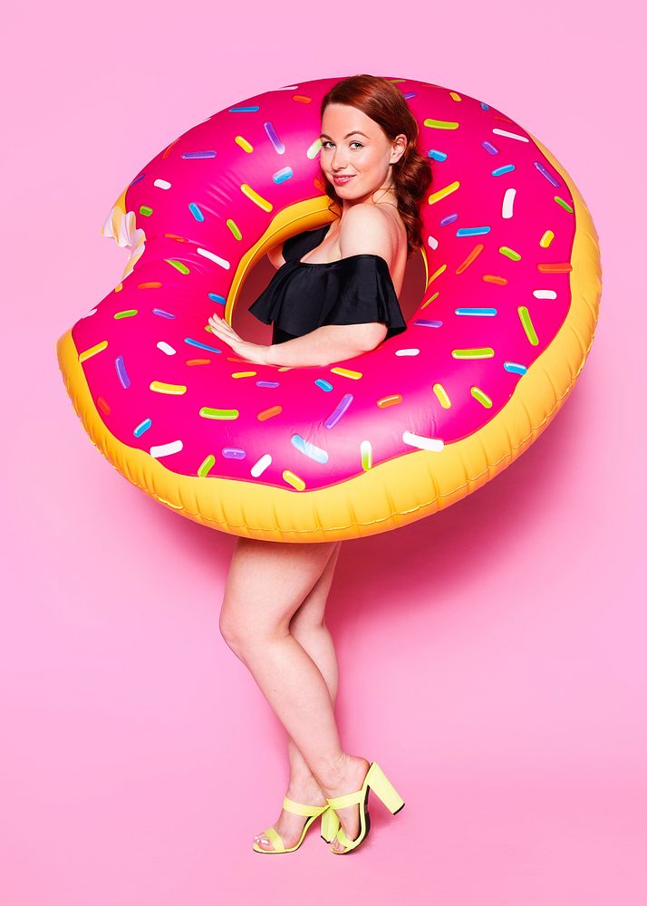 Woman wearing a swimsuit with an inflatable swim ring