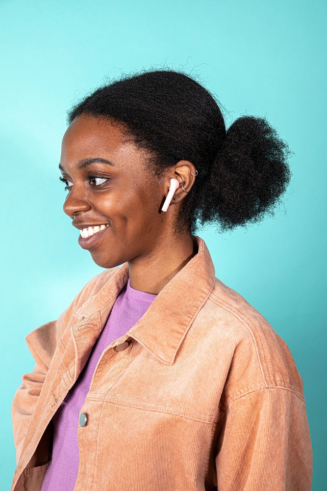 Cute woman wearing a white earphones