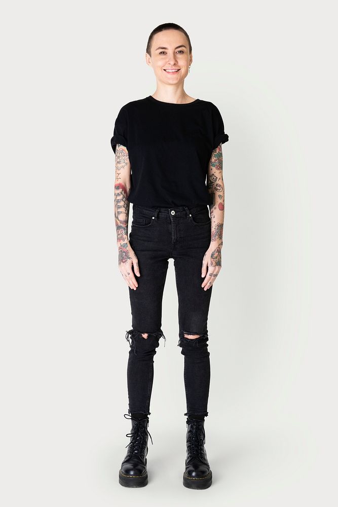 Model with tattoo in black t shirt and jeans mockup