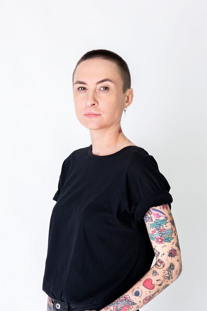 Model with tattoo in black T shirt