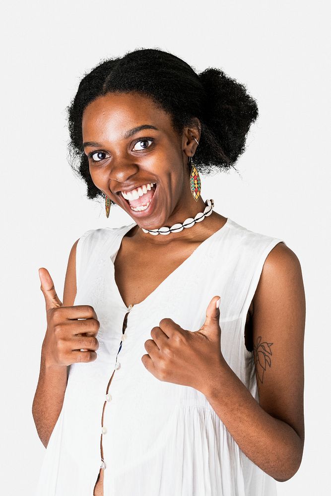 Cheerful African American girl thumbs up