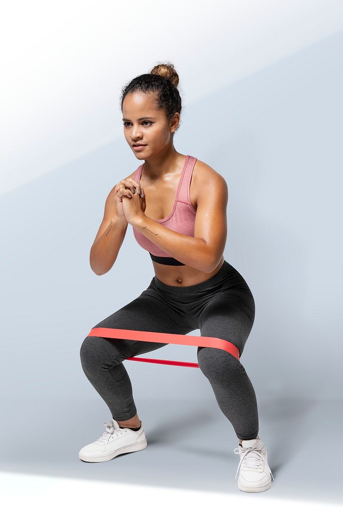 Active woman using a hip band in a squat position mockup 