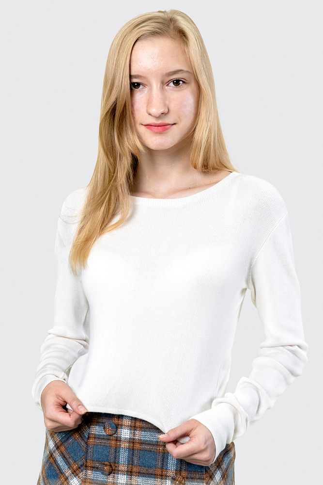 Young blonde girl wearing white sweater mockup