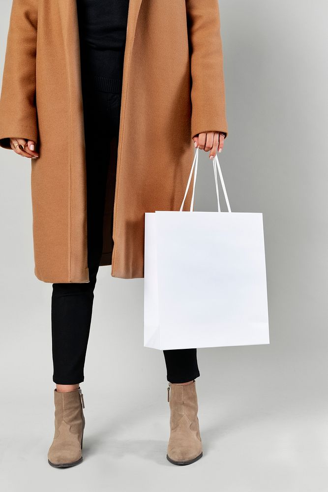 Woman carrying a shopping bag 