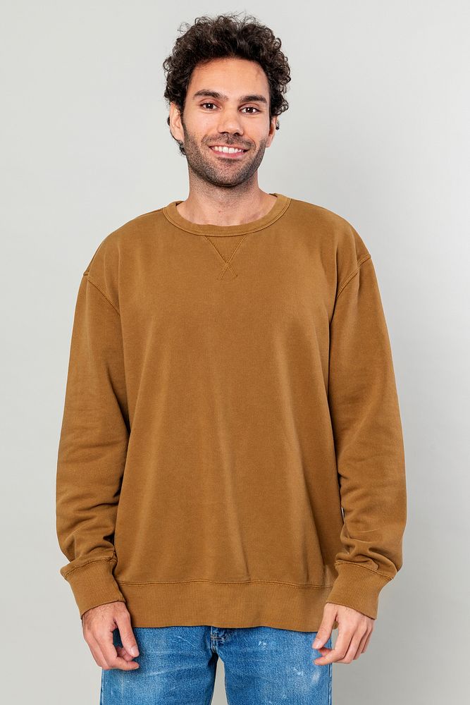 Cheerful man in gray sweater mockup