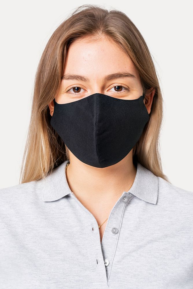 Woman in polo shirt and face mask in the new normal