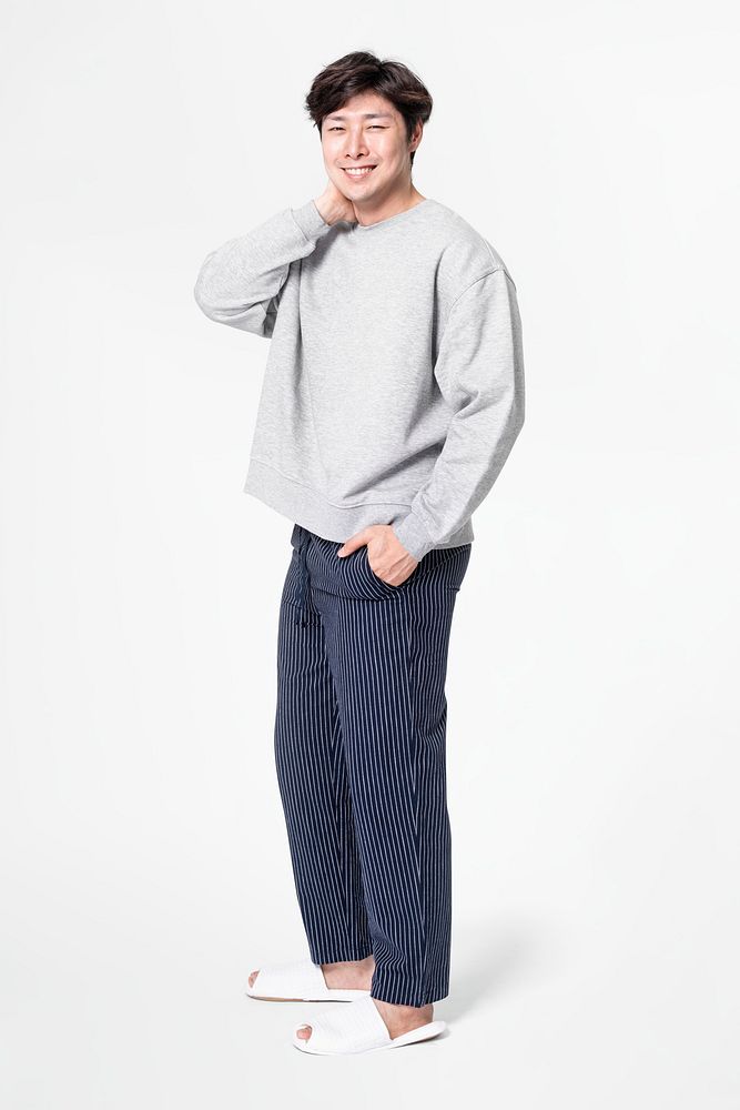 Man in gray sweater and pants sleepwear apparel full body