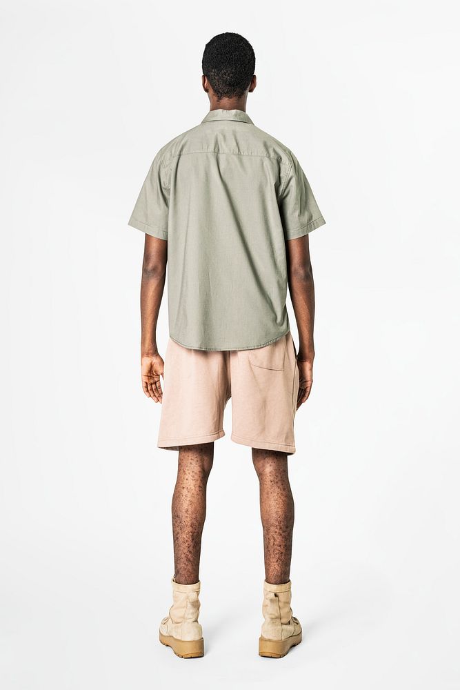African American man in gray shirt and shorts casual wear fashion