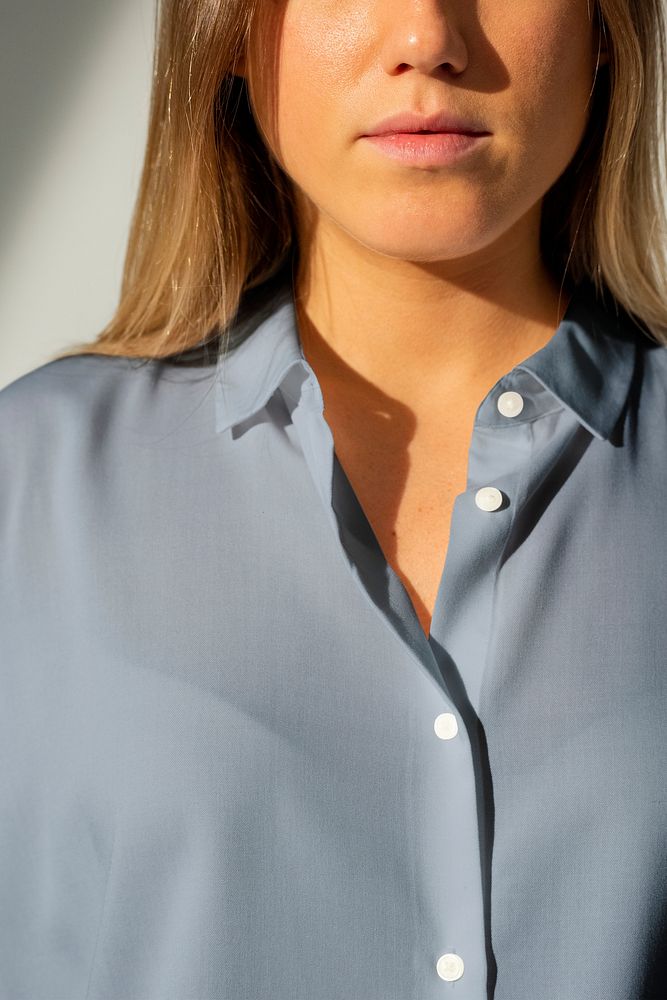 Woman wearing blue shirt mockup psd close up studio shoot