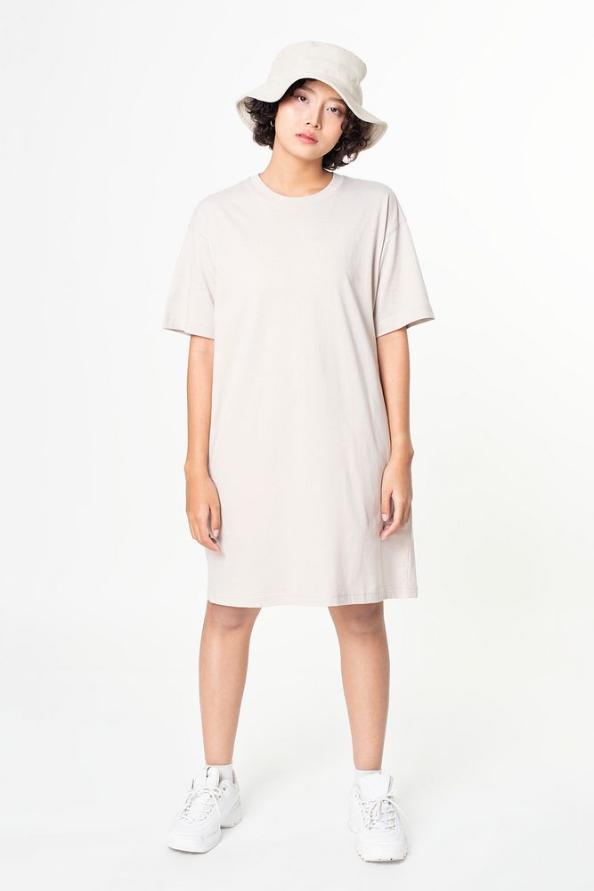 Woman in white t-shirt dress and bucket hat casual wear apparel