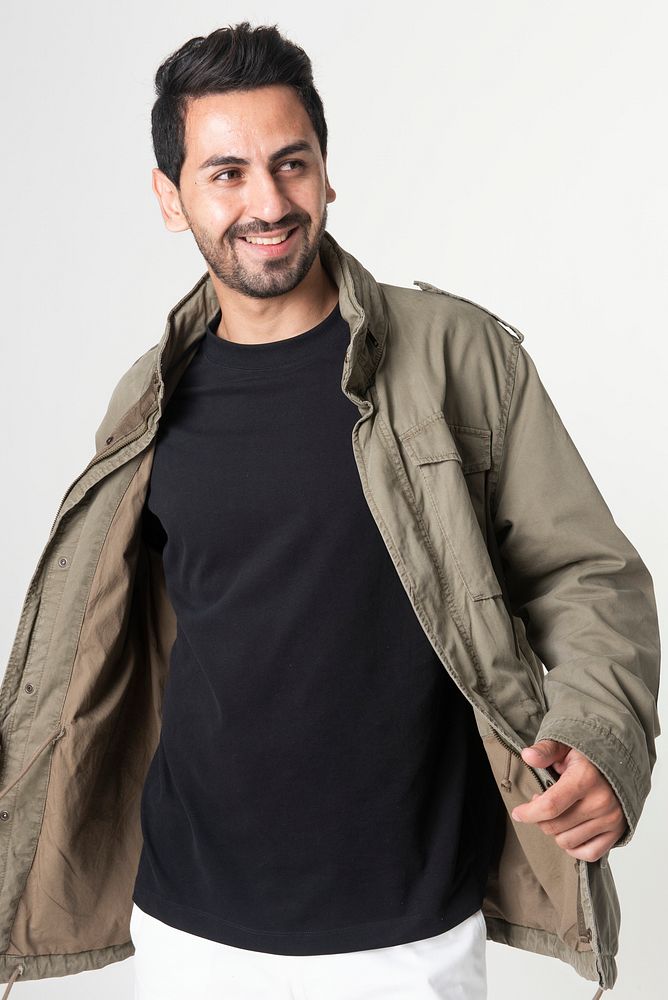 Man wearing green waxed cotton jacket portrait fashion shoot