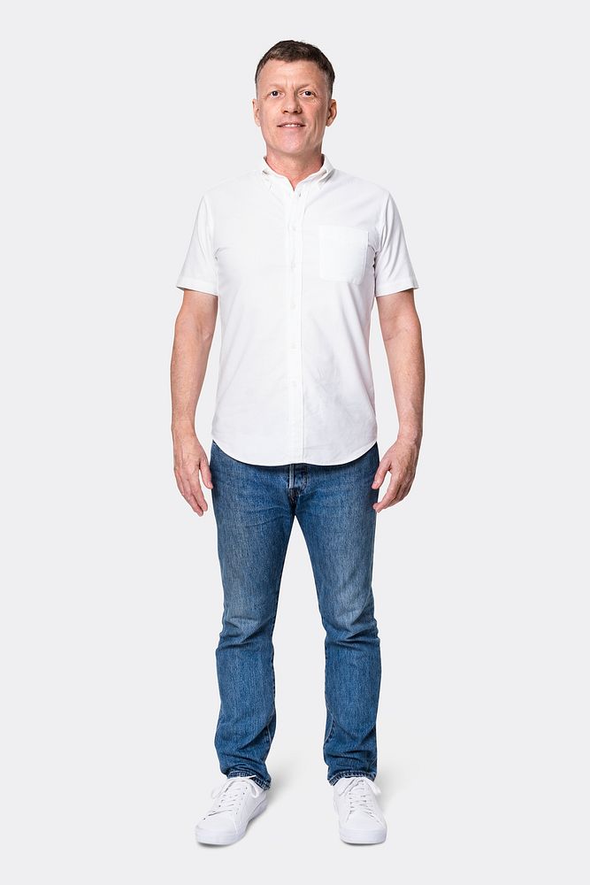 Senior man wearing white shirt with jeans