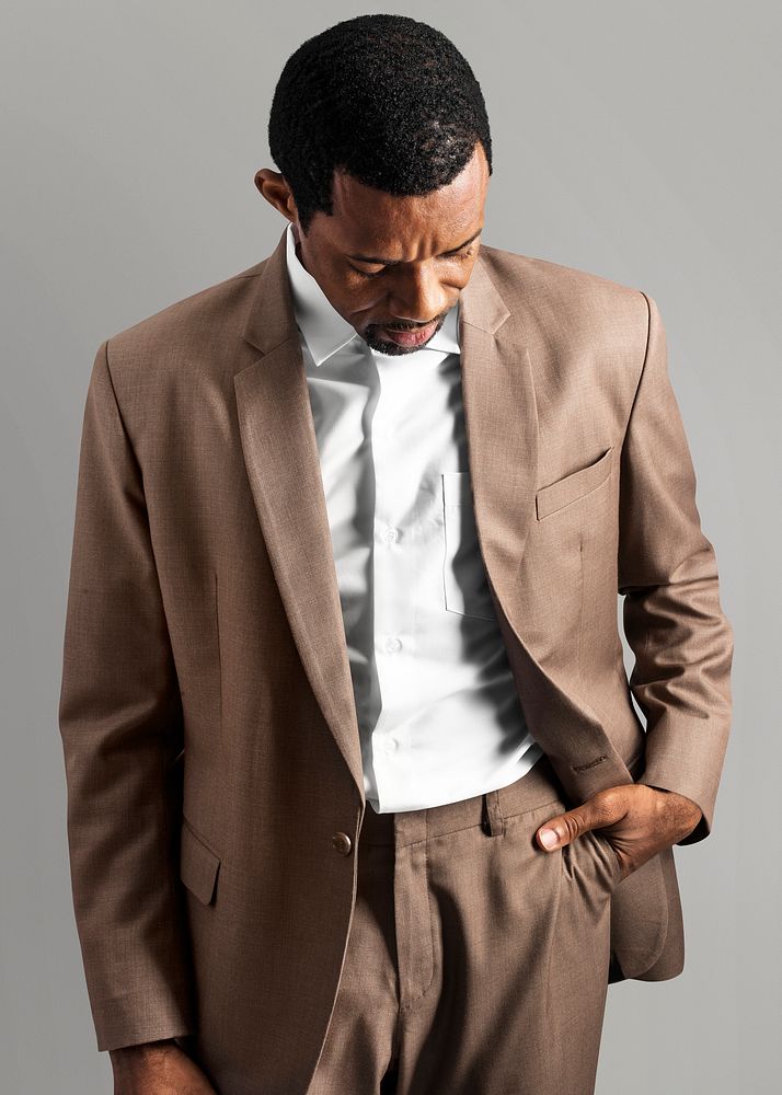 African American man wearing brown suit