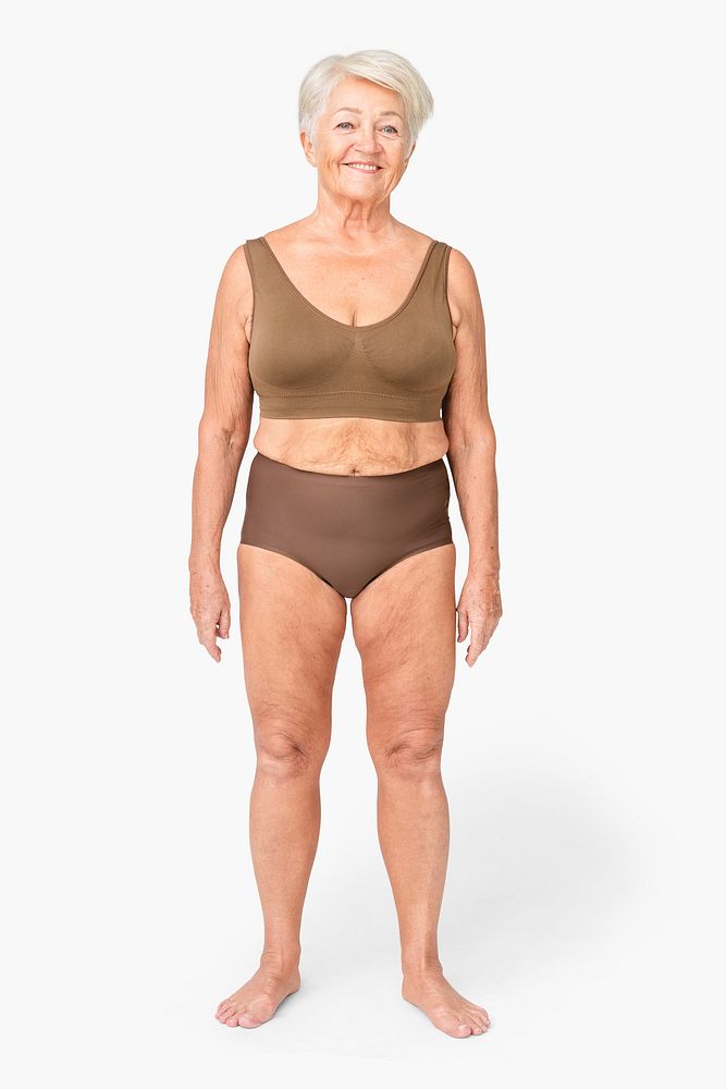 Size inclusive senior woman in brown lingerie studio portrait full body