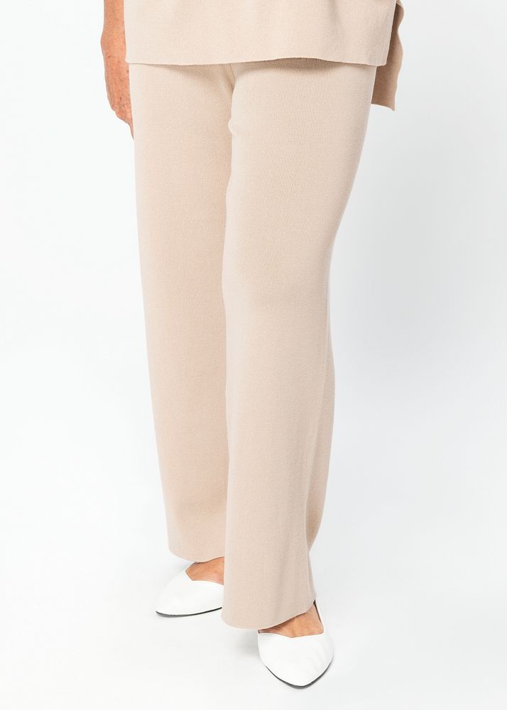 Woman in beige loose pants casual apparel