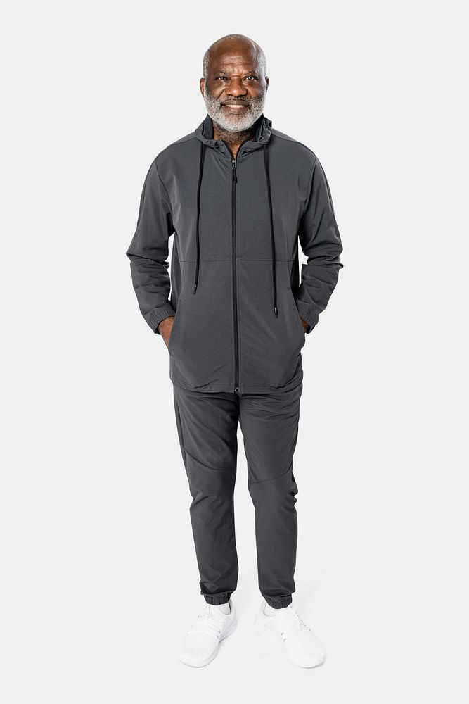 Senior man in dark gray tracksuit sportswear fashion portrait full body