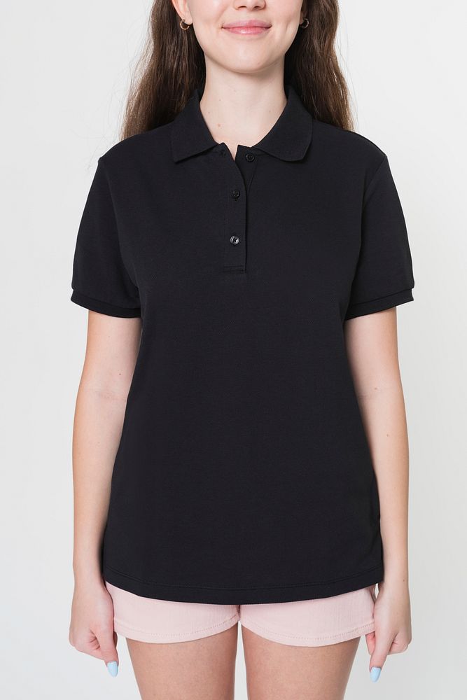 Teenage girl in black polo t-shirt for sporty youth fashion shoot