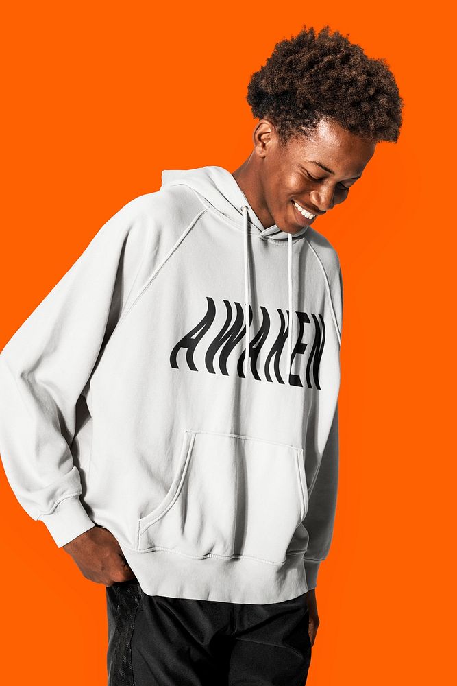 Beige hoodie mockup psd with printed AWAKEN typography street fashion