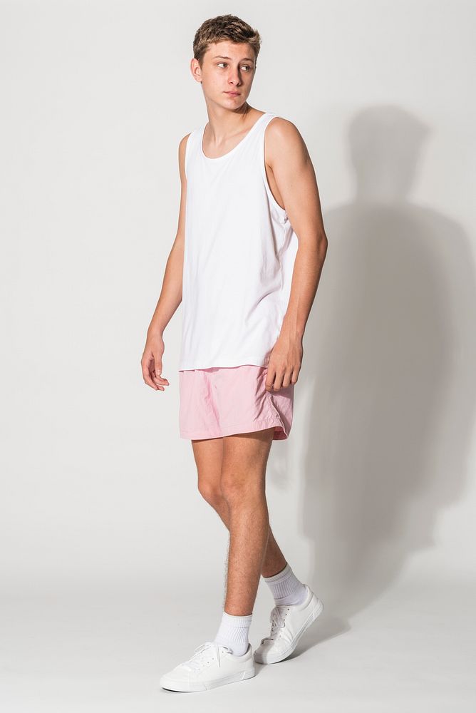 Men&rsquo;s white tank top and pink shorts for youth summer apparel shoot with design space