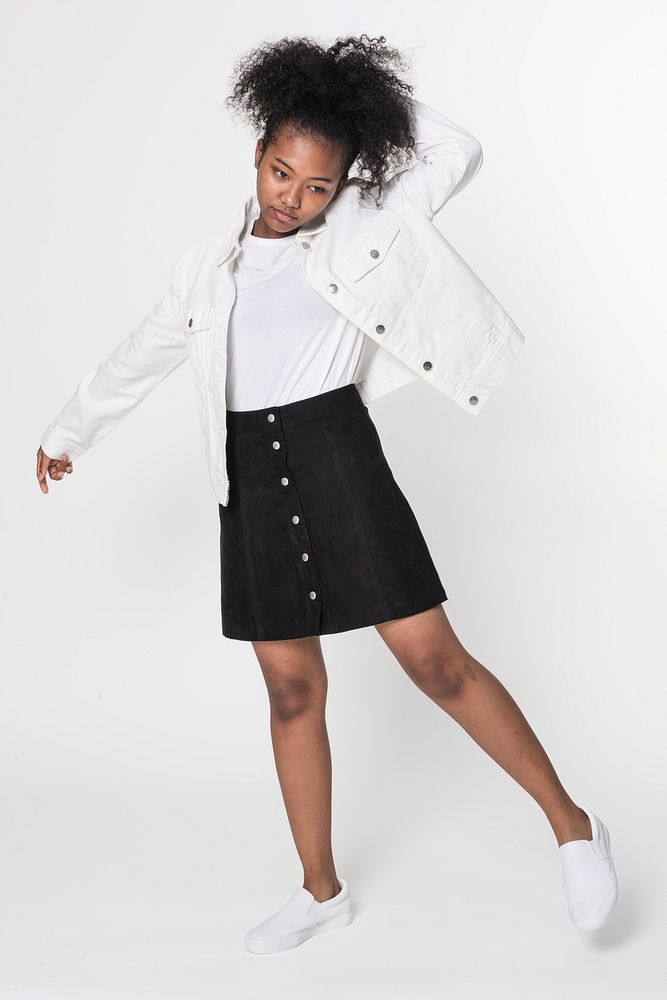 African American girl in white jacket outfit street fashion shoot full body