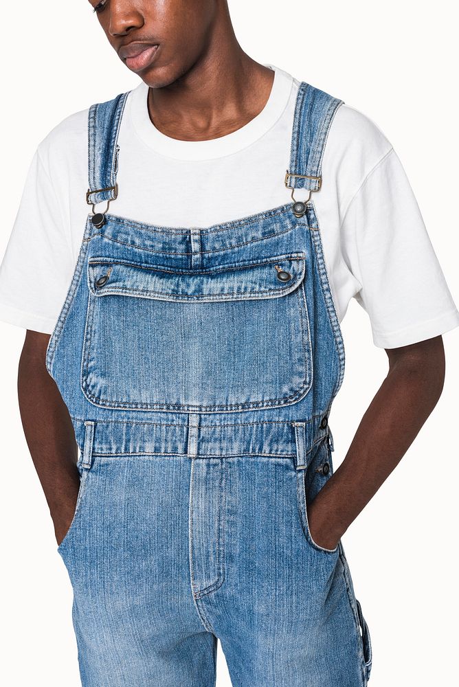 African American teen boy in denim dungarees streetwear apparel shoot
