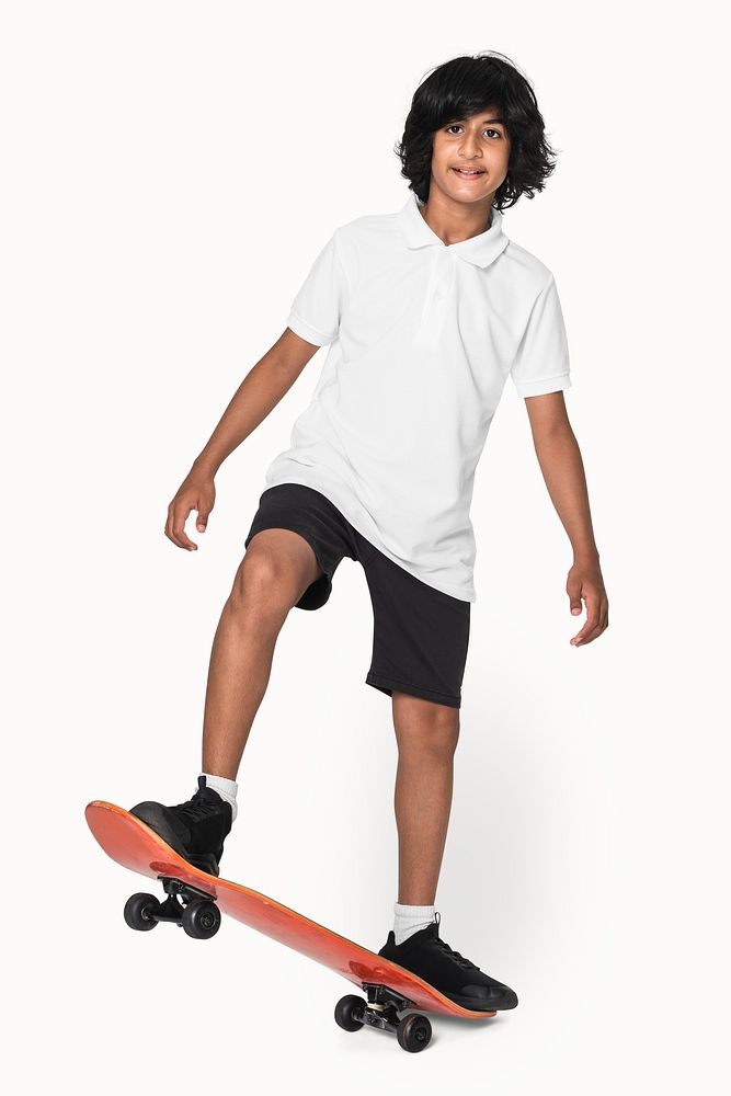 Teenage skater in white polo t-shirt sporty youth fashion studio shoot