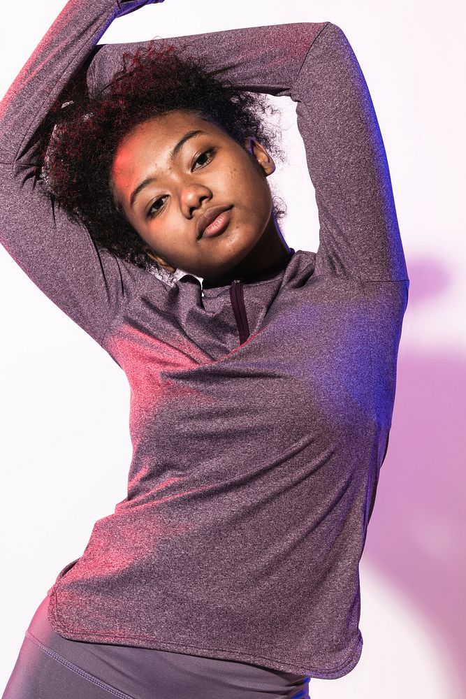 African American girl in purple active stretch jacket studio portrait