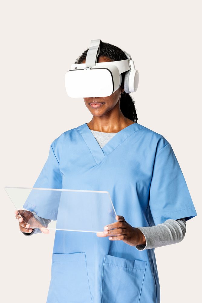 Doctor in VR glasses with medical uniform working on transparent tablet