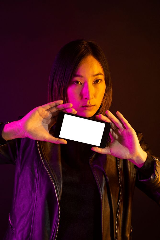 Asian woman holding blank screen smartphone innovative future technology