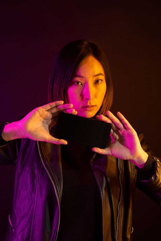 Asian woman showing blank screen smartphone innovative future technology