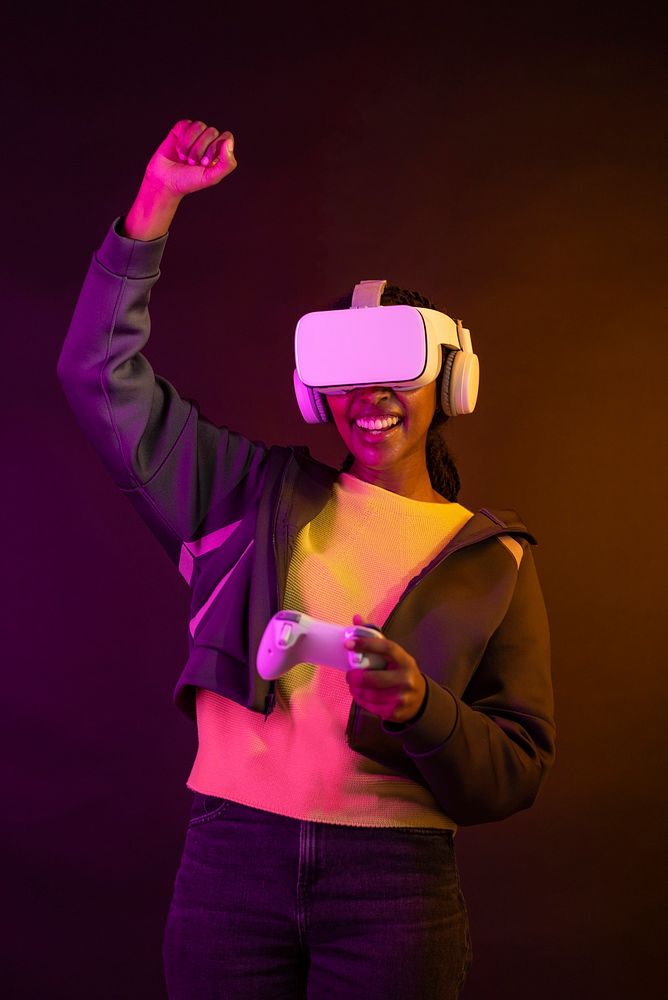 Woman playing game with VR headset virtual reality experience