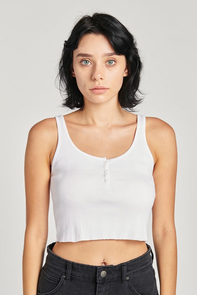 Woman in a white cropped tank top 