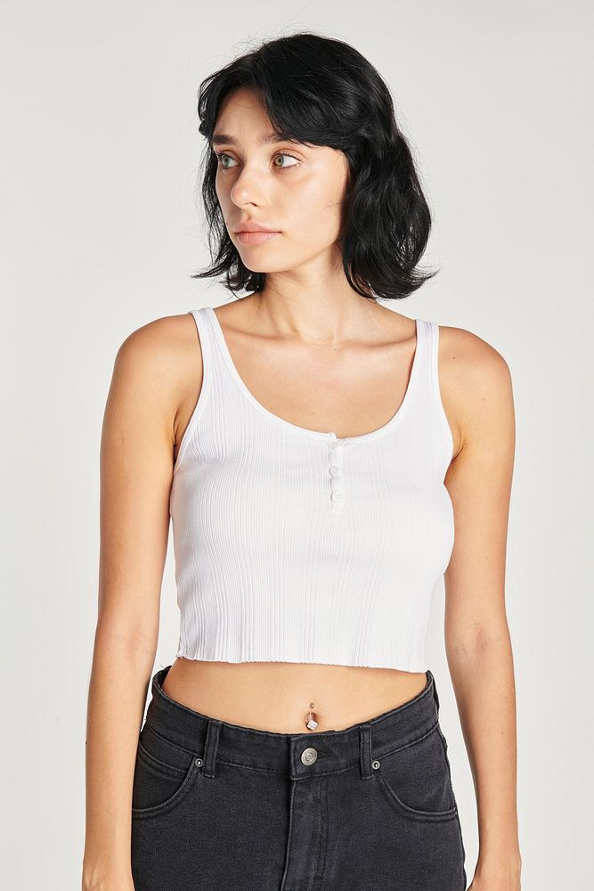 Women's white cropped tank top and a black skirt 