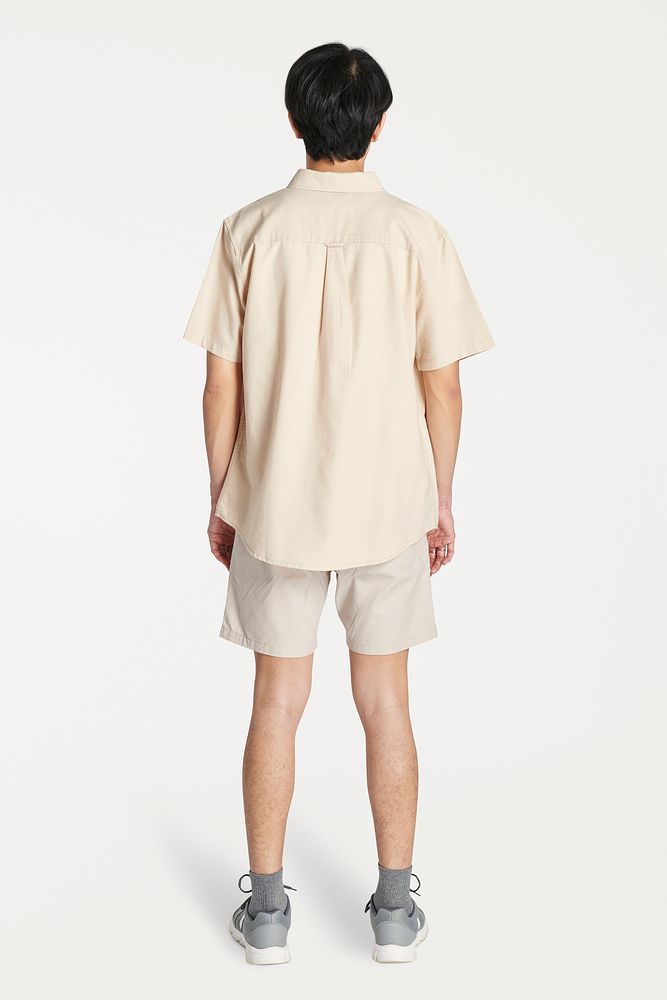 Men mockup in casual cream t-shirt and shorts rear view